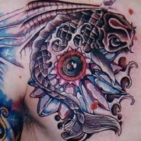 Star and fish tattoo on chest