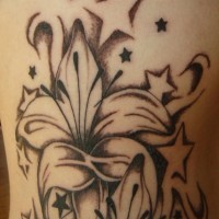 Stargazer lily with stars black ink tattoo