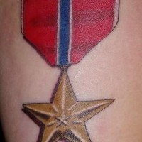 Star medal tattoo in colour