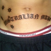 Stomach tattoo, australian made, black, styled inscription
