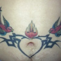 Stomach tattoo, fireing heart between two swallows