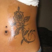 Stomach tattoo,colourful , black, designed rose