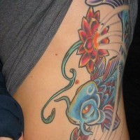 Stomach tattoo, blue catfish swimming in red shining flowers