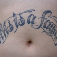 Stomach tattoo, this is a family, styled inscription