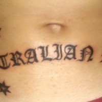 Stomach tattoo, australian made, styled inscription, stars