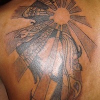 Firebird on sun tattoo