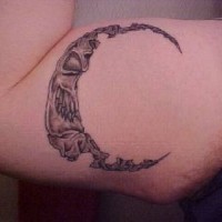 Evil moon crescent tattoo