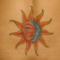 Colourful sun and moon tattoo
