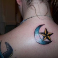 Sun and moon crescent tattoo on back