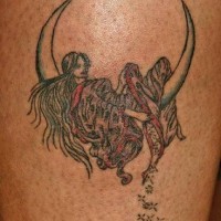 Girl on moon crescent tattoo