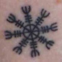 Symbole de planète, tatouage en encre noire
