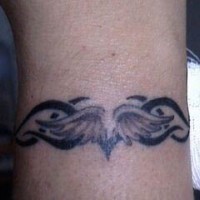 Tribal wings armband tattoo