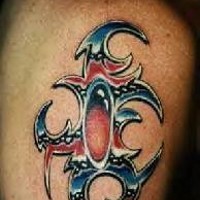 Metallic style tribal  tattoo