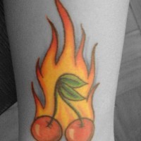 Flaming cherry tattoo in colour