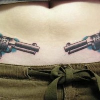 Stomach tattoo, two, symmetrical, styled  guns