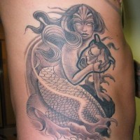 Tattoo of demon mermaid