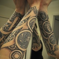 Designed circles  tattoo on arm