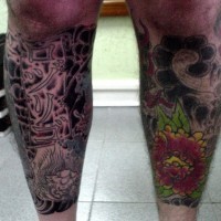 Tattoo on leg, designed sky and air black and colourful flower