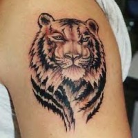 Black ink tiger head tattoo