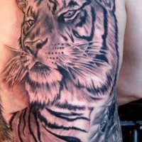 Black ink tiger large tattoo