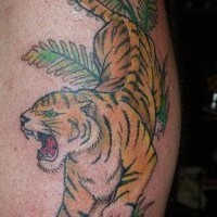 Tiger crawling through jungle  tattoo