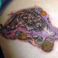 Tiger crawling through space tattoo
