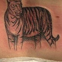 Standing tiger black ink tattoo