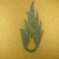 Tiny flame black ink tattoo