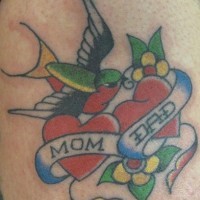 Traditional heart tattoo with bird and inscription mom dad