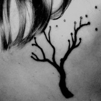Black scapular tattoo of lonely tree