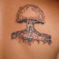 Scapula tattoo with house in the big tree