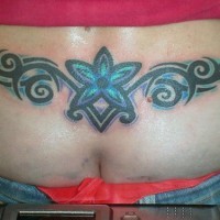 Lower back tattoo,blue, light, flower