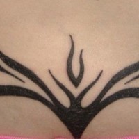 Tribal lower back tattoo, black, bold tree