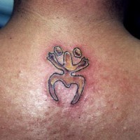 Small tribal symbol tattoo on back neck