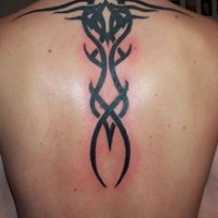 Black ink tribal tattoo on back