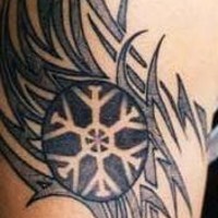 Tribal black tattoo with snowflake