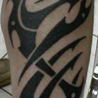 Big black tribal leg tattoo