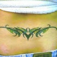Three colored tribal tattoo on lower back