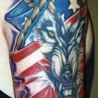 Tattoo with angry wolf on american flag