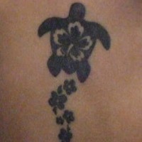 Turtle tattoo of black turtle and flowers
