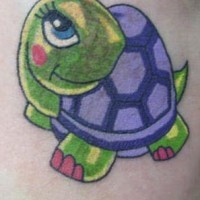Beautiful cartoon turtle with pink nails on tattoo