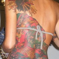 Geisha tattoo on upper back turned back