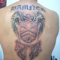On upper back warrior  with  shield and  flags tattoo