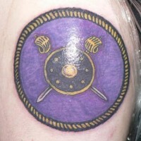 Tattoo of circle viking shield in violet color