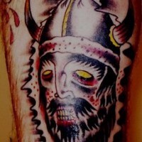 Viking warrior in helmet tattoo with bird on his head