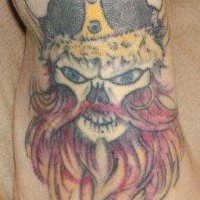 Colored viking skull foot tattoo