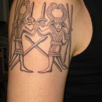 Shoulder tattoo with two warriors