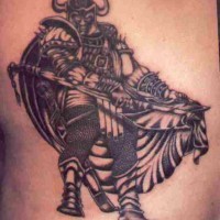 Black tattoo of viking warrior in full length