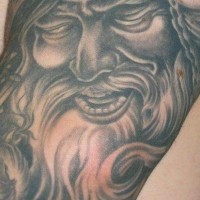 Smiling viking with closed eyes tattoo