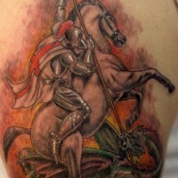 Warrior on horse slaying dragon tattoo